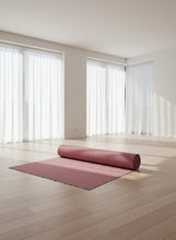 Load image into Gallery viewer, Roll of red auto furniture upholstery fabric.