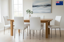 Load image into Gallery viewer, bison white vinyl upholstered dining chairs 
